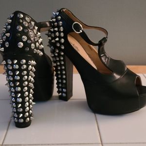 T-strape black faux leather w/ metal studded heels